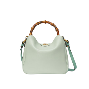 The light green leather bag has a soft texture